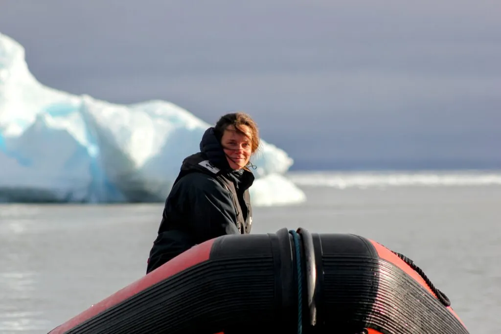 Land expedition. Co-Skipper Ingrid steering the dinghy.