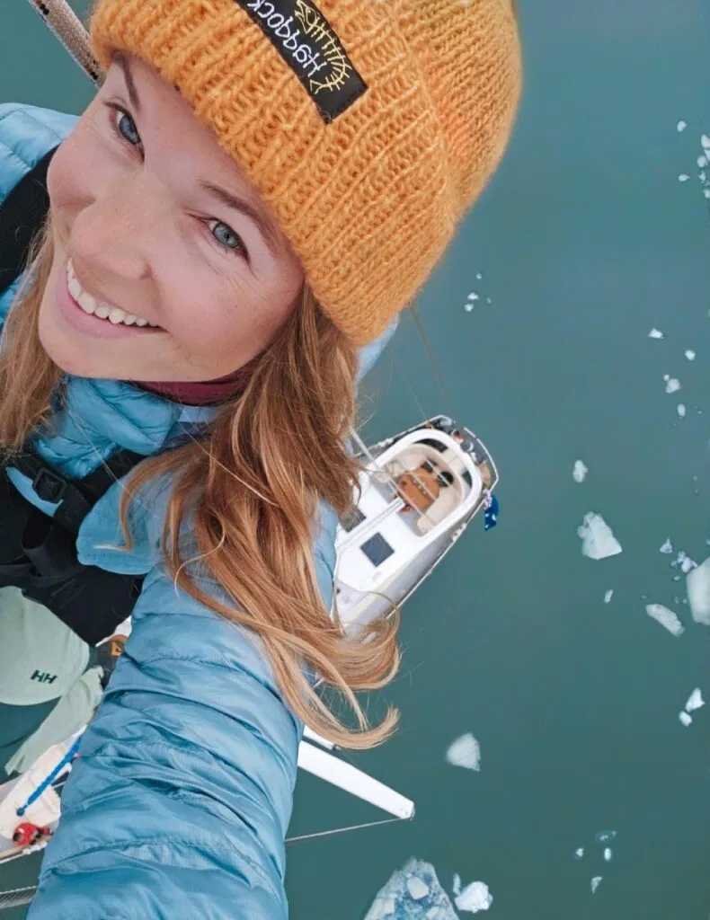 Linn in the mast! Around Svalbard, summer 2023. Photo Linn Elise Karlsen.